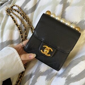 CHANEL Black Quilted Leather Mini Crossbody with Pearl Accent